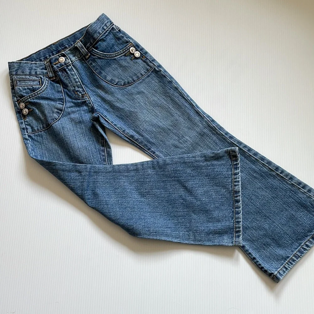 Gymboree flared jeans with gem buttons.  Girls size 7